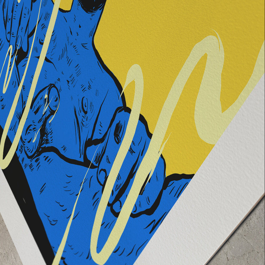 A square art print with a white border, featuring a graphic illustration in blue and yellow with black outlines and cream-colored squiggly lines, photographed on a gray concrete floor.
