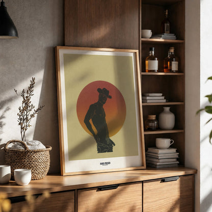 Framed artwork on a wooden shelf with decorative items