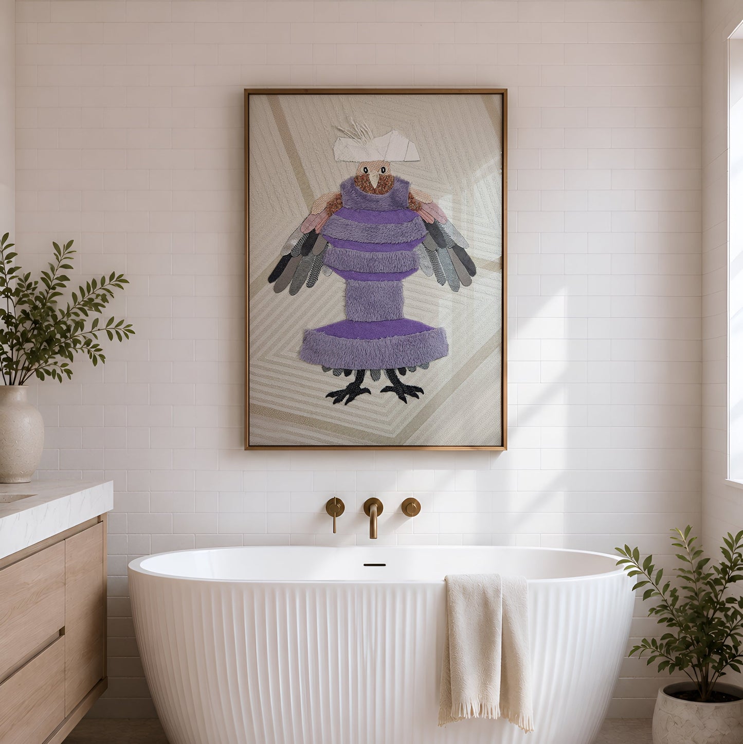A framed art print featuring a stylized purple bird character hangs on a white shiplap wall above a freestanding white ribbed bathtub in a bright bathroom with gold fixtures and potted plants.