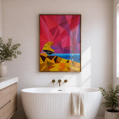 A modern freestanding bathtub in a bright bathroom, with a colorful framed abstract artwork hanging on the wall above it. The artwork features geometric shapes in pink, red, yellow, orange, and blue.